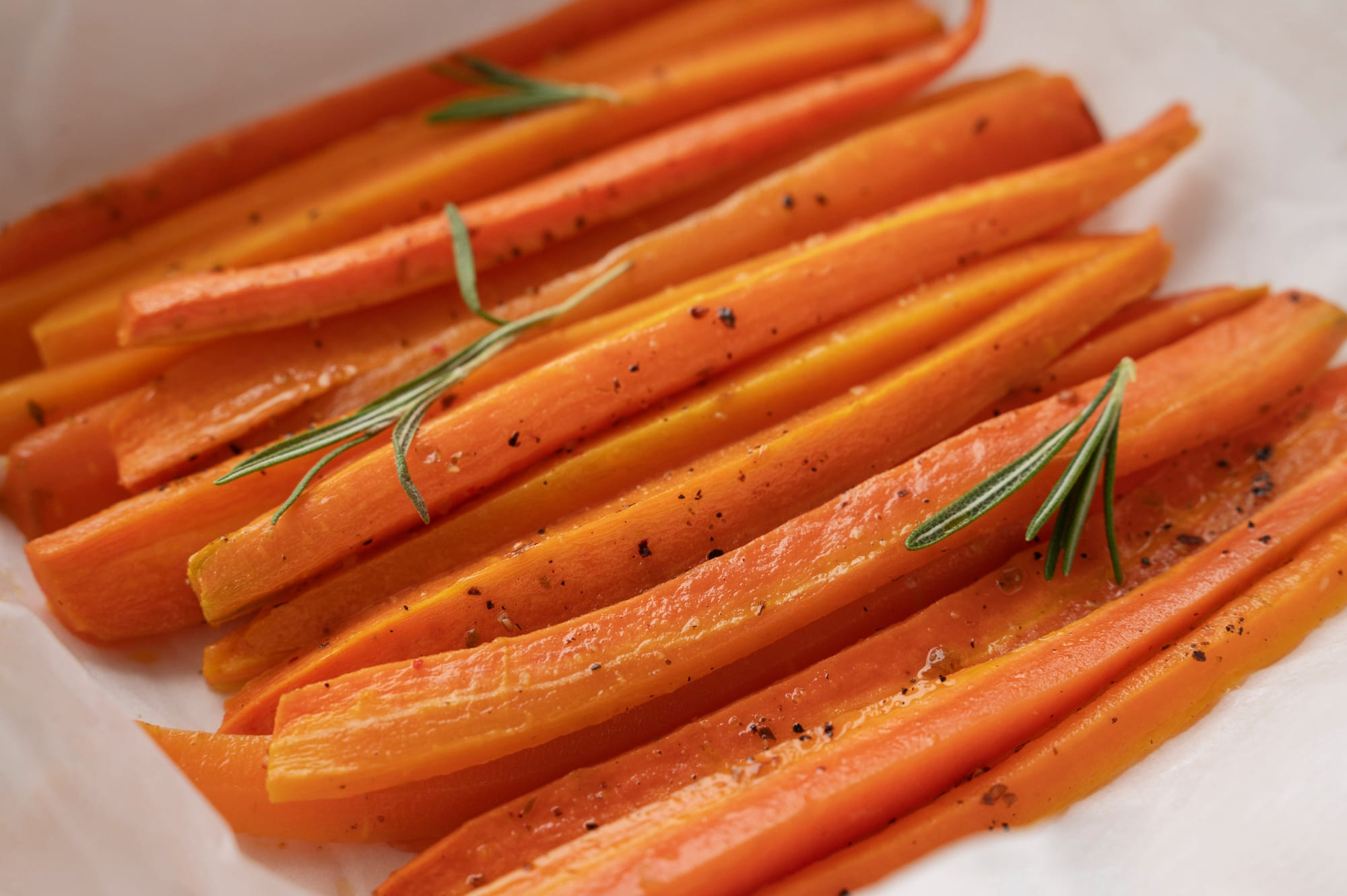 Freshly steamed carrots with rosemary